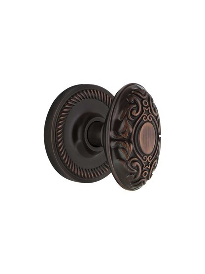 Rope Rosette Mortise Lock Set With Decorative Oval Knobs in Timeless Bronze.